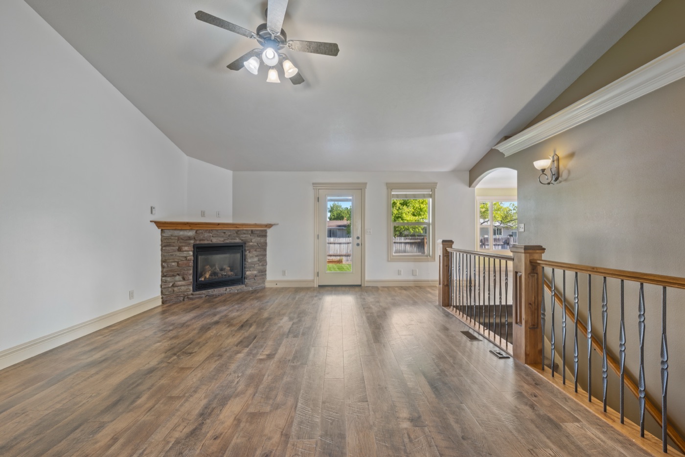 Living room showing open floor plan and back door